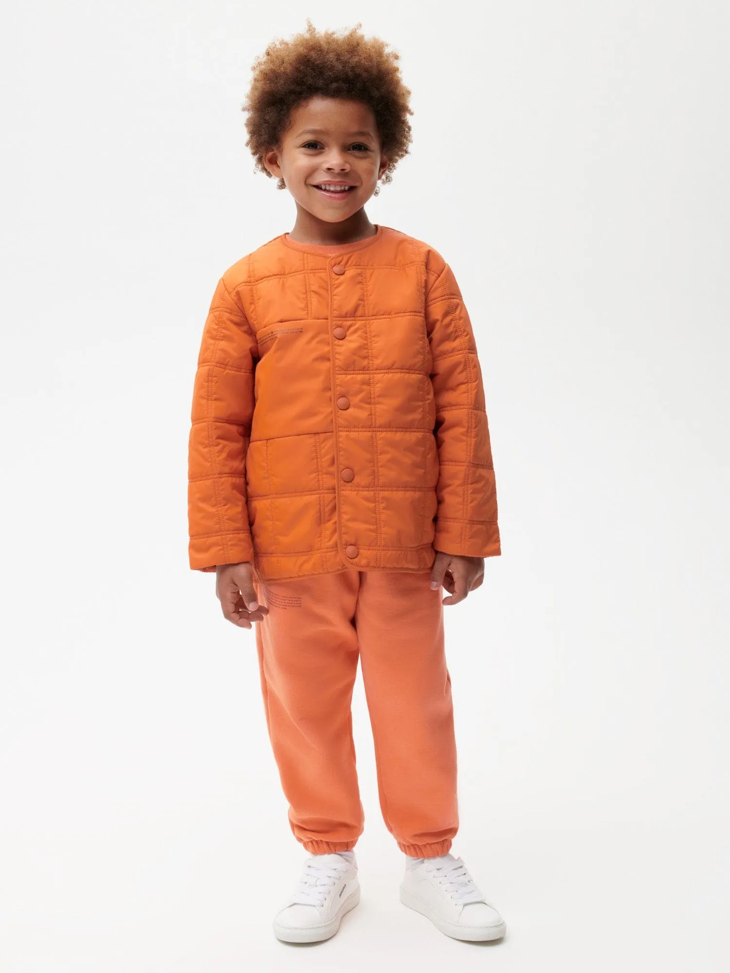 Archive Kid’s Flower-Warmth Quilted Collarless Jacket—cinnamon orange