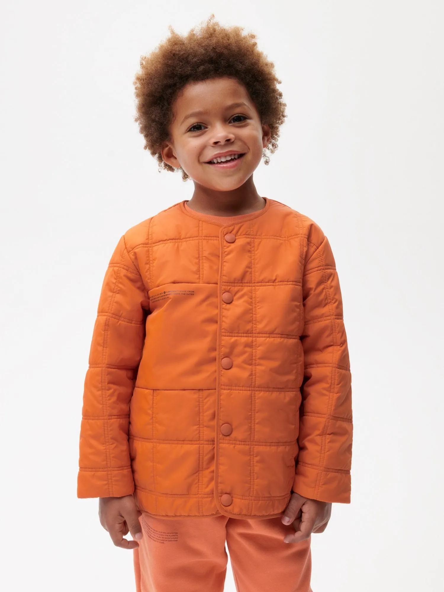 Archive Kid’s Flower-Warmth Quilted Collarless Jacket—cinnamon orange