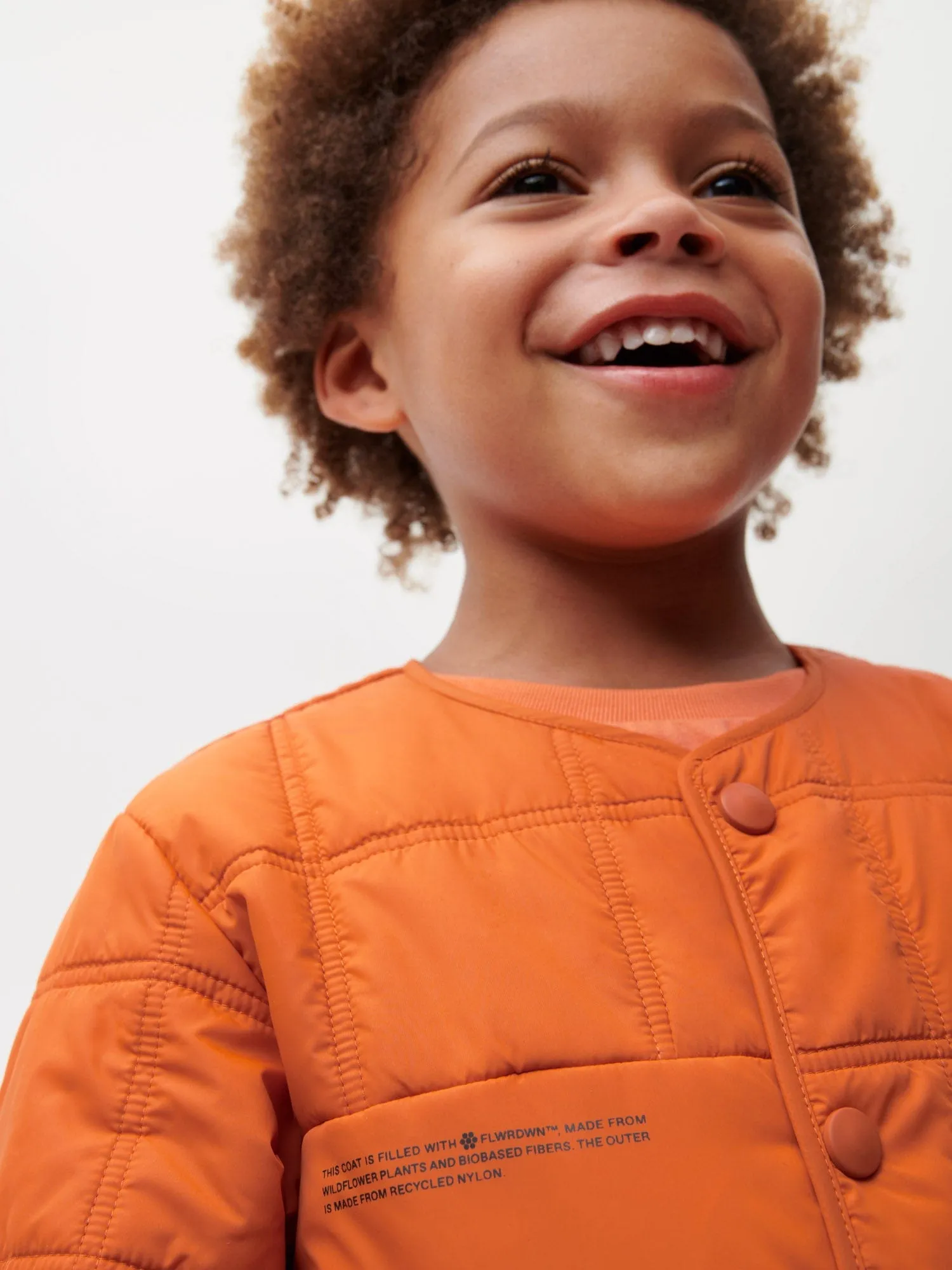 Archive Kid’s Flower-Warmth Quilted Collarless Jacket—cinnamon orange